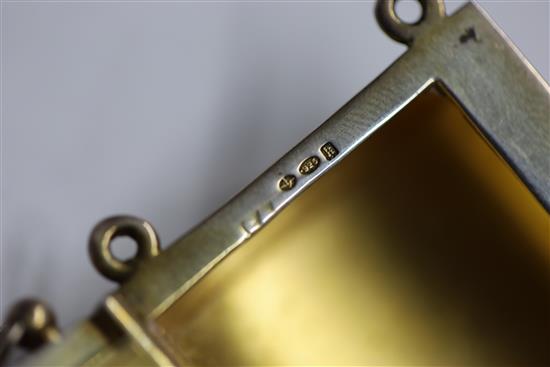 A ladys 1920s silver gilt and gilded red enamelled ovoid minaudiere, import marks for Cohen & Charles, London, 1925, 82mm.